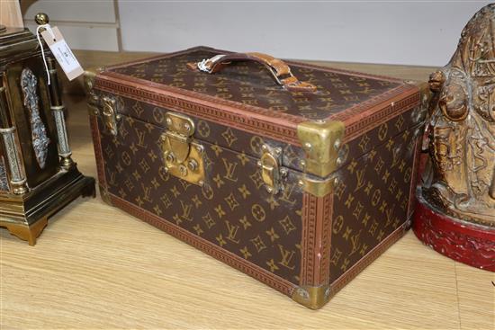 A Louis Vuitton vanity case, serial number 949439 (mirror damaged)